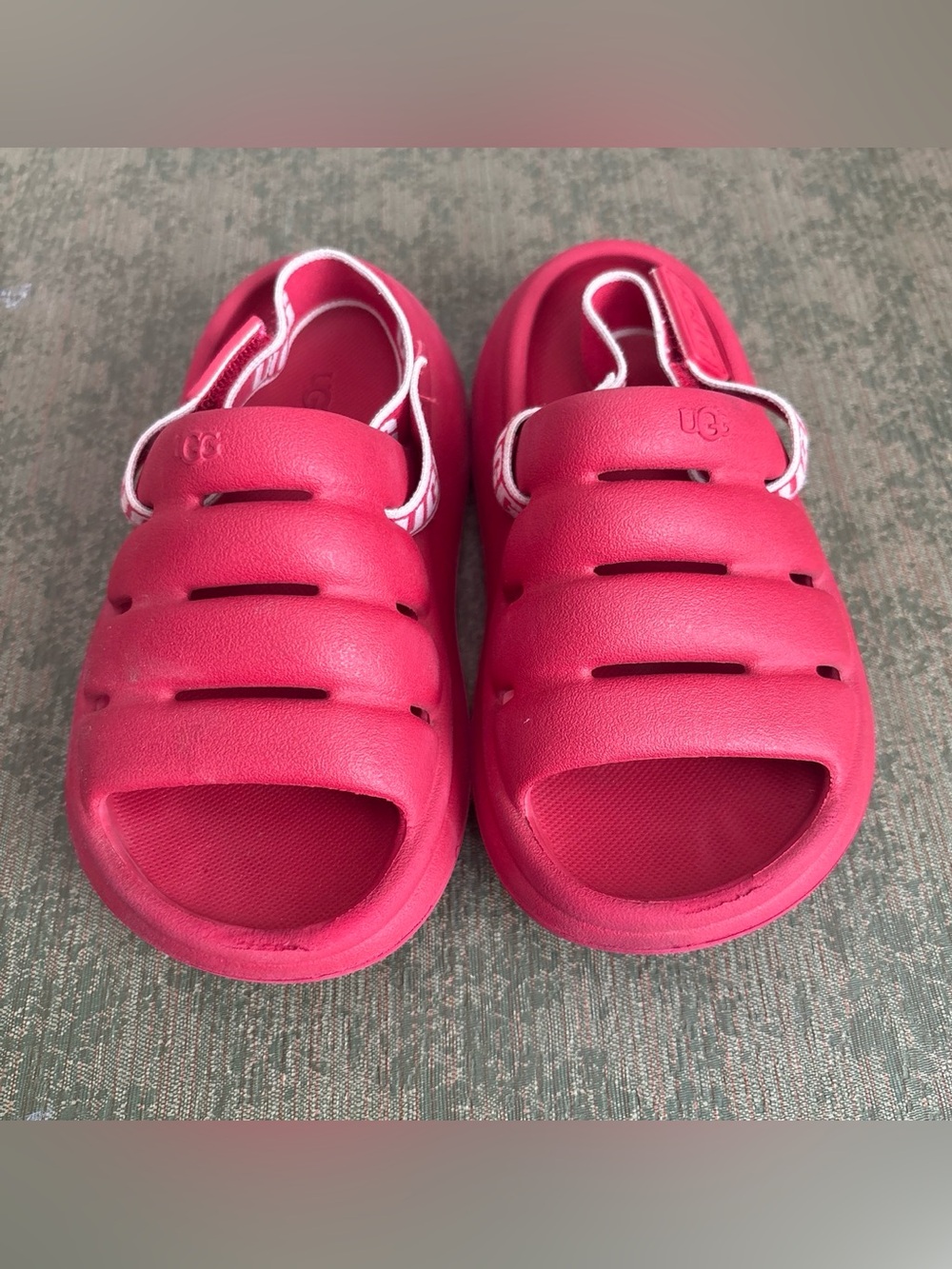 UGG Kids Burgundy Slip-On Sandals with Back Strap.